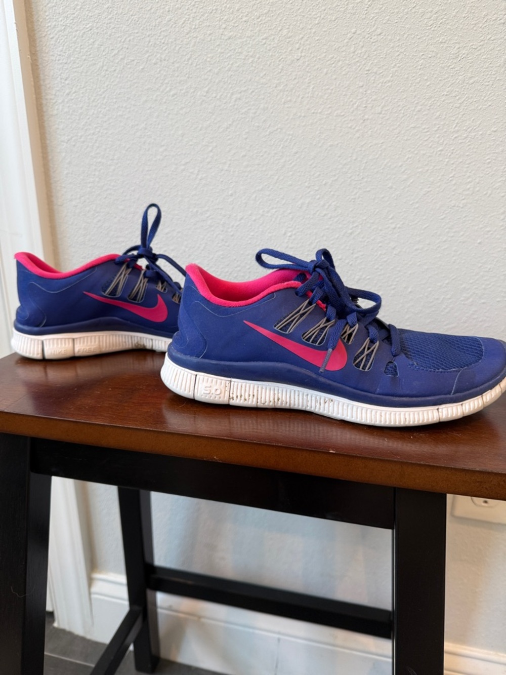 Nike Blue Running Shoes with Pink Accents
